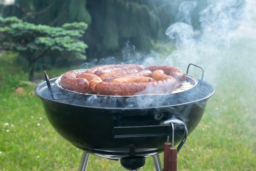 grilling sausages, garden charcoal grill